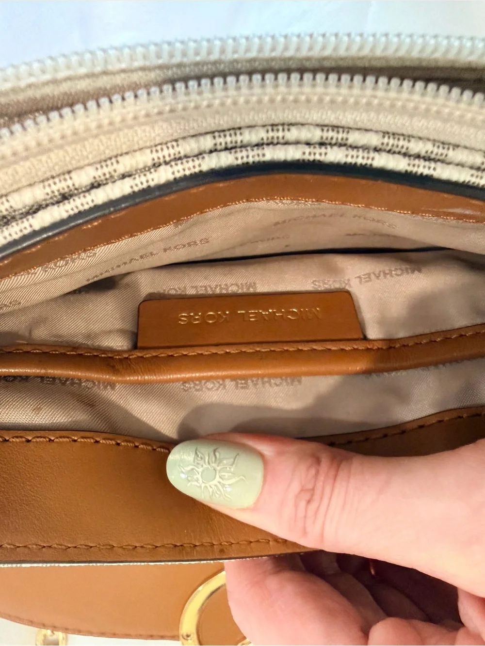 Michael Kors White and Brown Logo Crossbody with Gold MK Medallion